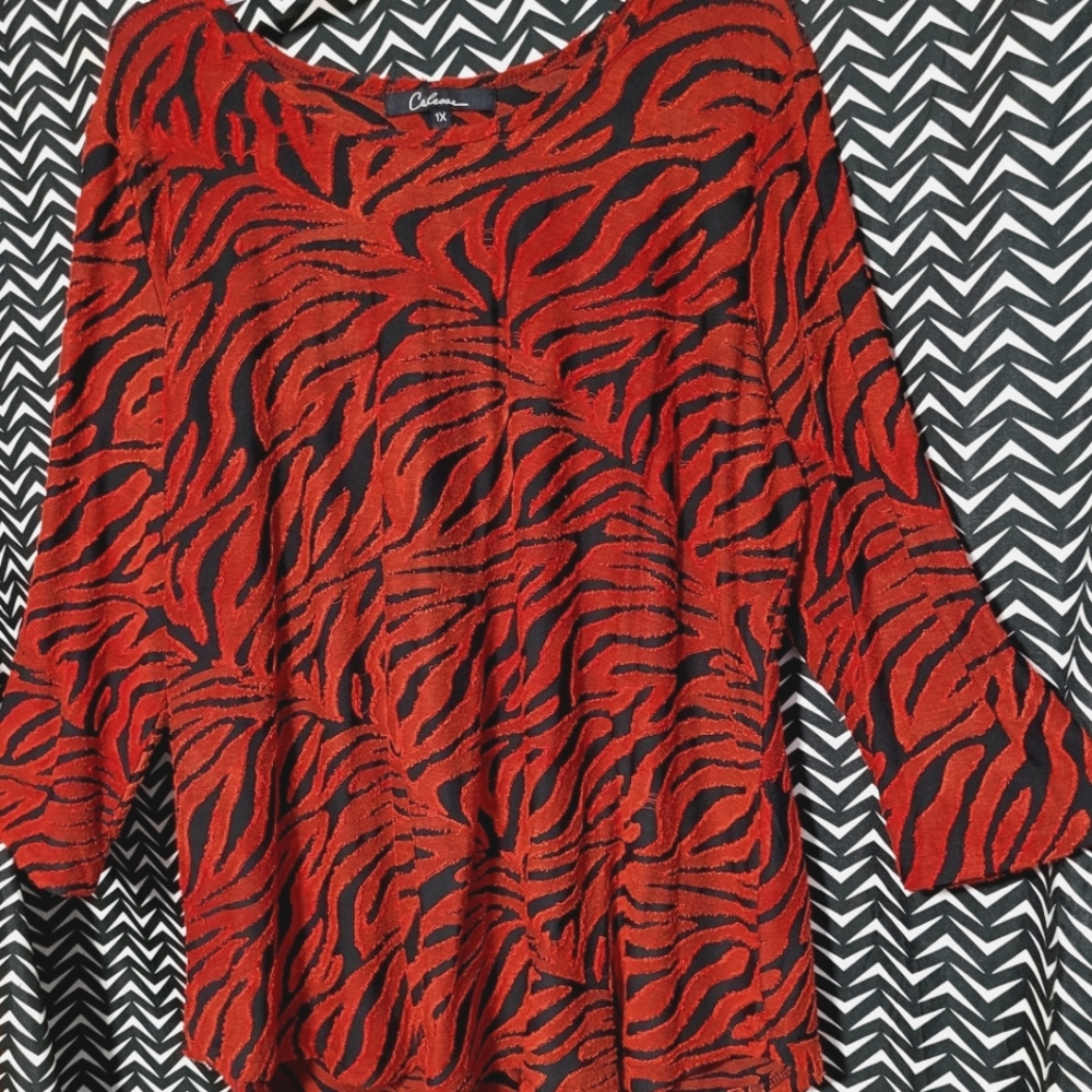 A Red and Black Tiger  Print Light Sweater by: Calessa